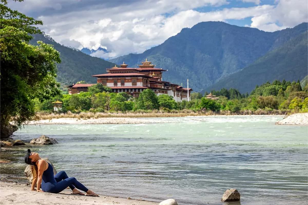 A solo traveller in Bhutan, walking with her guide