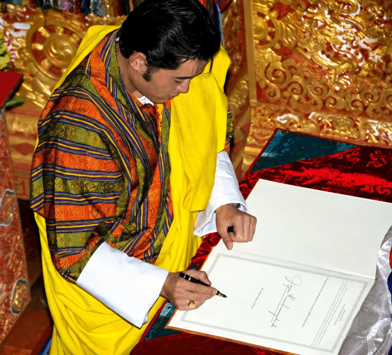 The signing of the Constitution of Bhutan at Tashichho Dzong, 18 July 2008